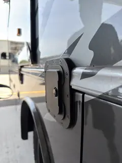 Installed RV Fuel Vault closed, showing a clean, factory-finished side profile