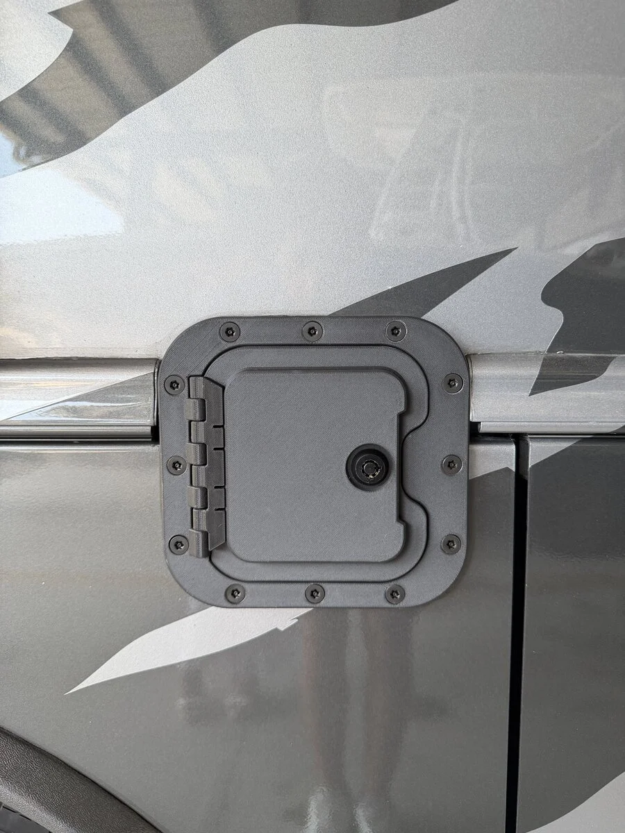 RV Fuel Vault open to show protected diesel access on a motorhome